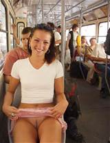 Pictures of my girlfriend flashing her pussy in a public bus.