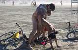 ... â€ filmed engaged in vile public fornication act by Burning Man spy