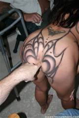 Insane brunette with painted body shows her anal hole with finger ...