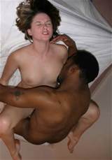 My wife in hard interracial porno pictures with big black stud.