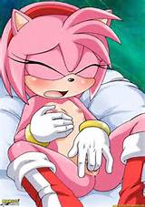 Amy Rose masturbating with gloved hand and squeezing her tit